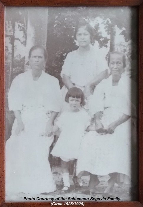 L-R: Josefa Lujan Asang (her mother), Anita Schumann (daughter), Nicolasa Asan (Standing) and Nicolasa Camacho Santos Lujan (her grandmother)